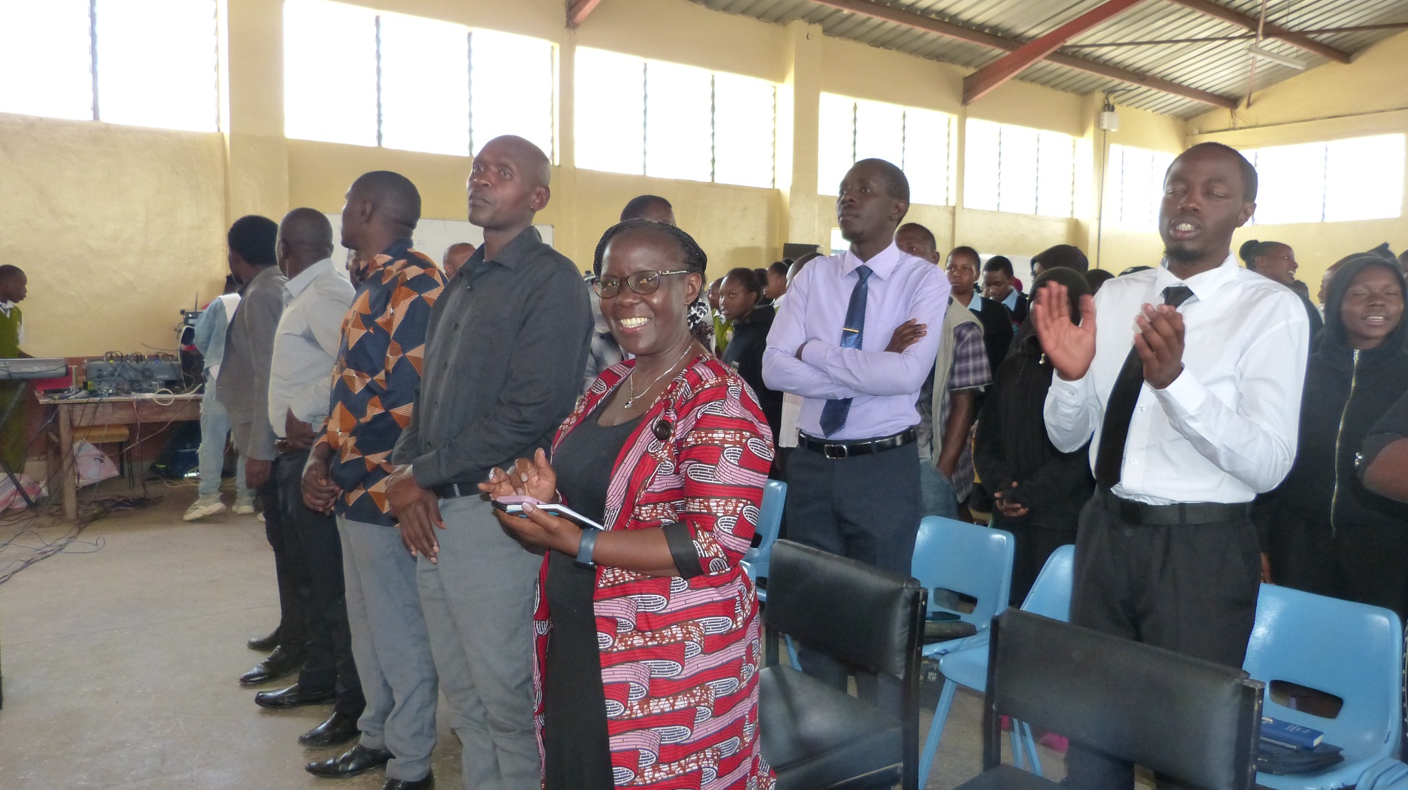 Clara Ngobolia and others participating in a Christian gathering in Kenya